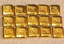 Vàng thế giới sụt hơn 2% do lạc quan về vắc-xin ngừa Covid-19