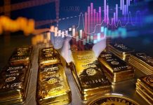 Vàng giảm giá vì đồng USD giữ đà tăng, SPDR Gold Trust bán ròng